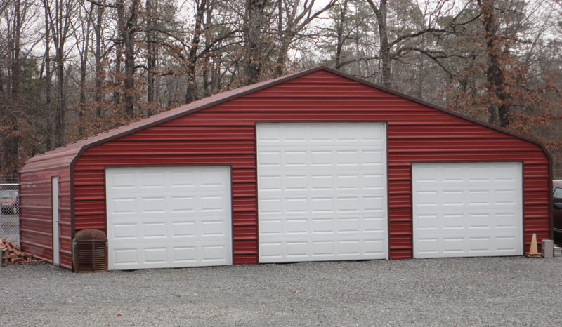 36 x 30 triple wide barn with taller center garage door.