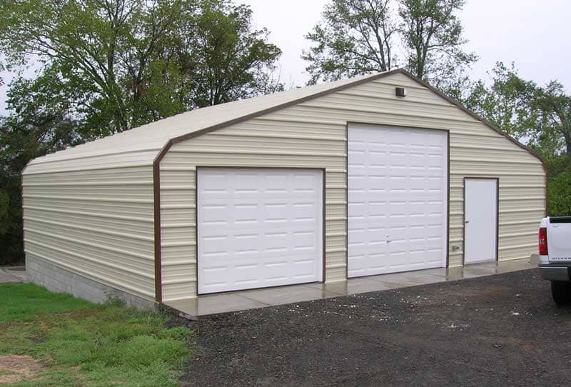 36 x 20 enclosure with 9 x 7 and 10 x 10 garage doors and 4 ft walk door.