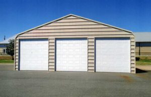 36 x 30 triple wide enclosure raised 3' taller with 3 10x10 garage doors.