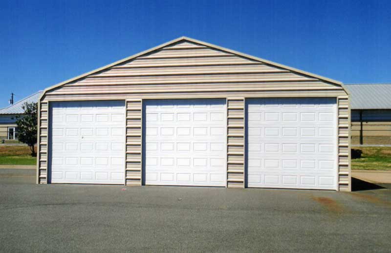 36 x 30 triple wide enclosure raised 3' taller with 3 10x10 garage doors.